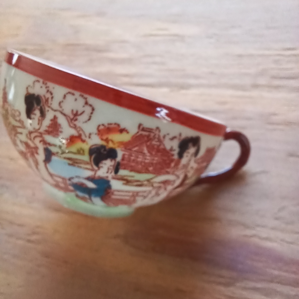 Two Porcelain demitasse cups made in Asia. No saucer is available.